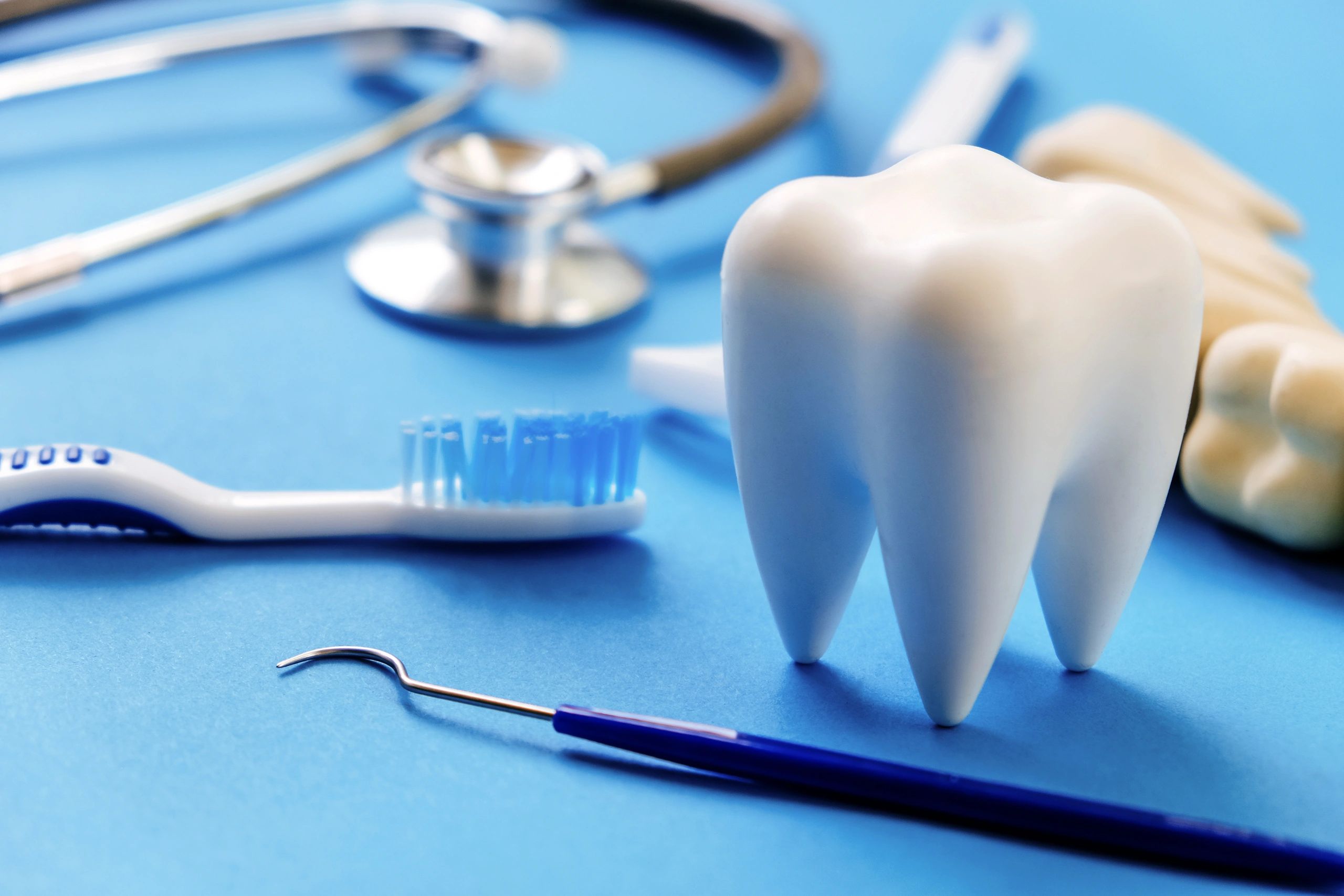 Dental model and equipment representing CAD CAM titanium disc applications